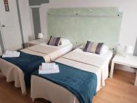 Postel nebo postele na pokoji v ubytování Hotel Horizonte