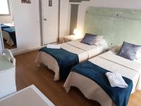 Postel nebo postele na pokoji v ubytování Hotel Horizonte