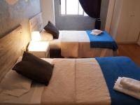 Postel nebo postele na pokoji v ubytování Hotel Horizonte