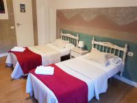Postel nebo postele na pokoji v ubytování Hotel Horizonte