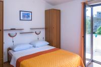 Łóżko lub łóżka w pokoju w obiekcie Rooms Stolfa