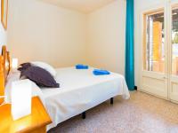 A bed or beds in a room at Apartment Velazquez-2 by Interhome
