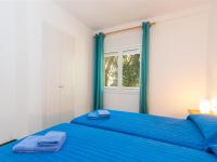 A bed or beds in a room at Apartment Velazquez-2 by Interhome