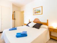 A bed or beds in a room at Apartment Velazquez-2 by Interhome
