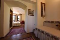 A bed or beds in a room at Villa Konak Hotel