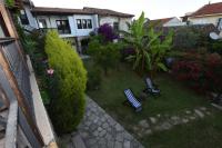 A garden outside Villa Konak Hotel