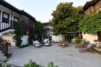 A garden outside Villa Konak Hotel