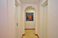 a hallway with a painting on the wall at City Living Suites TK2 Rm 2 in St. Julianʼs