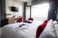 Posteľ alebo postele v izbe v ubytovaní Hotel K10