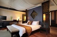 Ein Bett oder Betten in einem Zimmer der Unterkunft Dusit Thani Laguna Phuket
