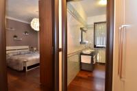 Posteľ alebo postele v izbe v ubytovaní Erno Apartment