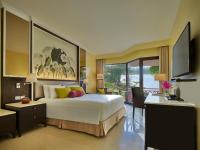 Ein Bett oder Betten in einem Zimmer der Unterkunft Dusit Thani Laguna Phuket