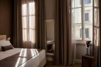 The Frame Hotelにあるベッド