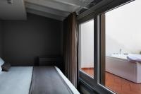 The Frame Hotelにあるベッド