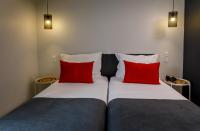 Uma cama ou camas num quarto em Sport Hotel Gym + SPA