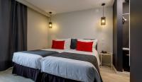 Uma cama ou camas num quarto em Sport Hotel Gym + SPA