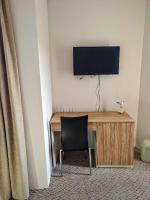 TV a/nebo společenská místnost v ubytování Hotel Mida