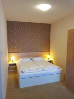 Postel nebo postele na pokoji v ubytování Hotel Mida