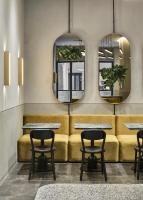 A seating area at Perianth Hotel