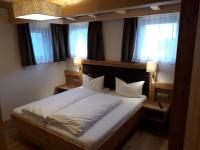 Posteľ alebo postele v izbe v ubytovaní Apartment Kristall