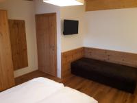 Posteľ alebo postele v izbe v ubytovaní Apartment Kristall