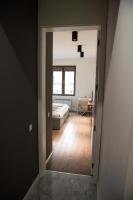Postel nebo postele na pokoji v ubytování Apartment Rotonda
