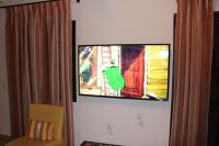 TV a/nebo společenská místnost v ubytování Villa Rena