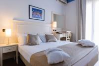 Posteľ alebo postele v izbe v ubytovaní Hotel Fra I Pini