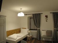 A bed or beds in a room at La Molinela B&B