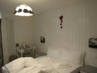 A bed or beds in a room at La Molinela B&B