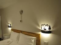 A bed or beds in a room at La Molinela B&B