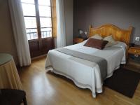 Cama o camas de una habitación en Hotel Restaurante Casa Petronila
