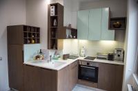 Kuchyň nebo kuchyňský kout v ubytování Apartment Rotonda