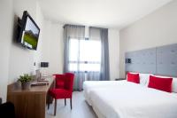 Televízia a/alebo spoločenská miestnosť v ubytovaní Hotel K10