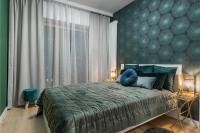 Posteľ alebo postele v izbe v ubytovaní Mennica Residence Chic Apartment