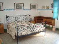 A bed or beds in a room at Il Chicco d'Oro