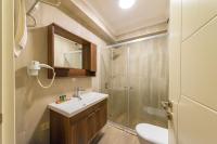 Koupelna v ubytování Joy Suites