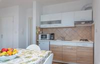 Kuchyň nebo kuchyňský kout v ubytování Apartment Complex Iris