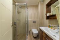 Koupelna v ubytování Joy Suites