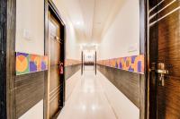 FabHotel Corporate Crown - Nr Jyoti Nivas Universityの見取り図または間取り図