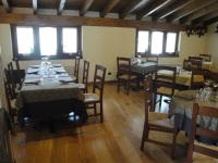 A restaurant or other place to eat at Locanda del Brinsc