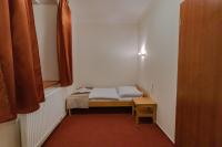 Postel nebo postele na pokoji v ubytování Penzion U řízků