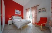 Posteľ alebo postele v izbe v ubytovaní Secret Paradise Villas