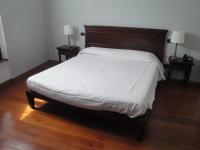 A bed or beds in a room at Locanda del Brinsc