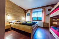 Postel nebo postele na pokoji v ubytování Apartmány Domino