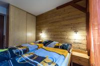 Postel nebo postele na pokoji v ubytování Apartmány Domino