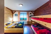 Postel nebo postele na pokoji v ubytování Apartmány Domino