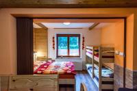 Postel nebo postele na pokoji v ubytování Apartmány Domino
