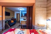 Postel nebo postele na pokoji v ubytování Apartmány Domino