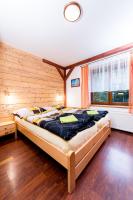 Postel nebo postele na pokoji v ubytování Apartmány Domino